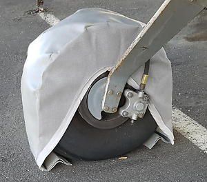 Chockers.  protective wheel covers with built in chocks. fits aircraft 6.00-6