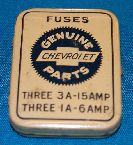 Vintage 1930s chevrolet automobile metal fuse tin with vintage fuses