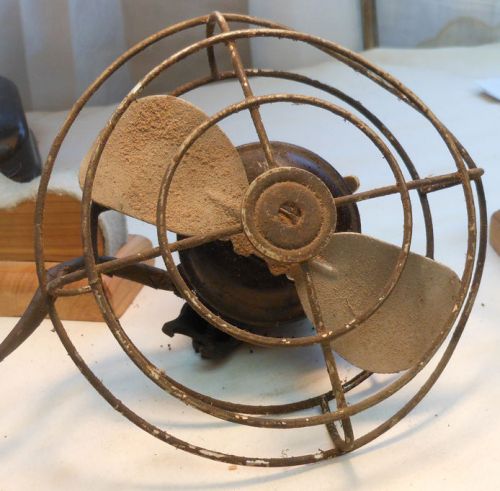 Vintage electric car defroster fan.