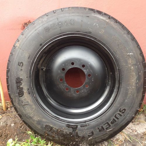 Dexter 17.5 trailer wheel with a like new tire