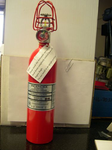 Compact automatic discharge halon fire extinguisher