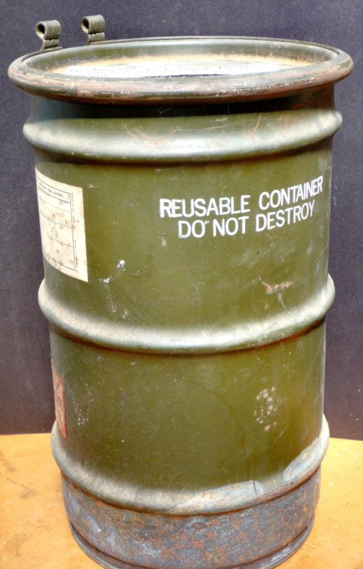 Steel storage drum w/original packing material vintage wwii man cave collectable