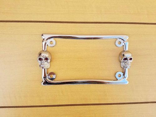 Chrome license plate frame for motorcycle.