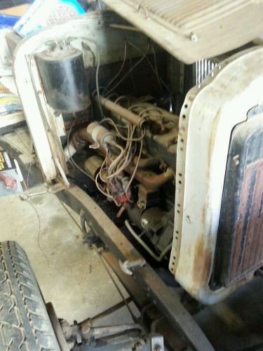1927 oldsmobile running chassis. has 5 new tires and two extra wooden spoke whee