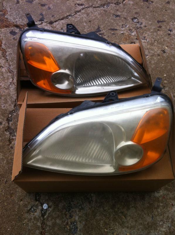 2002 honda civic headlight capsules both sides