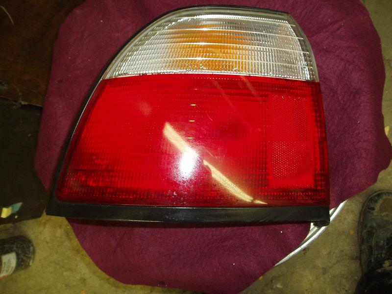 97 98 accord 4 door right passenger tail light used 