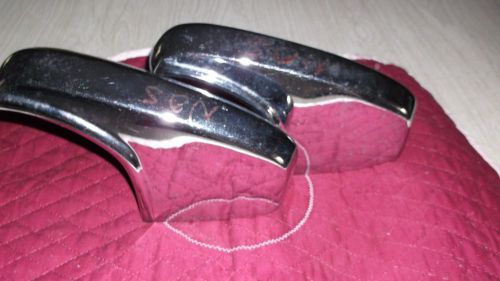 Nos rear taillight guards for 62 chev. car chrome