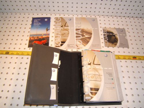 Vw 2004 touareg owner manual&#039;s oem 1 booklet with gray outer vw oem 1 case