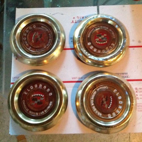 Four 1956 cadillac eldorad0 gold turbine/sabre hubcaps with gold corona oem rare