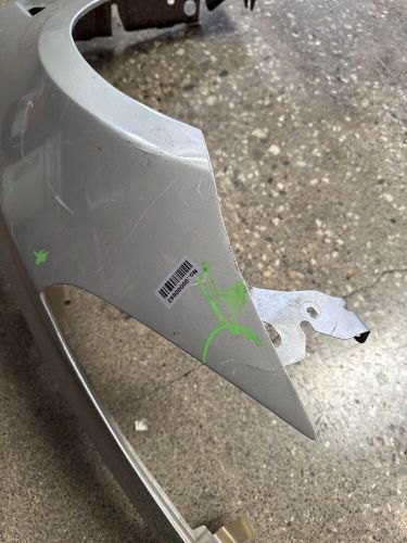 1081400-e0-d tesla model 3 left fender silver (843)