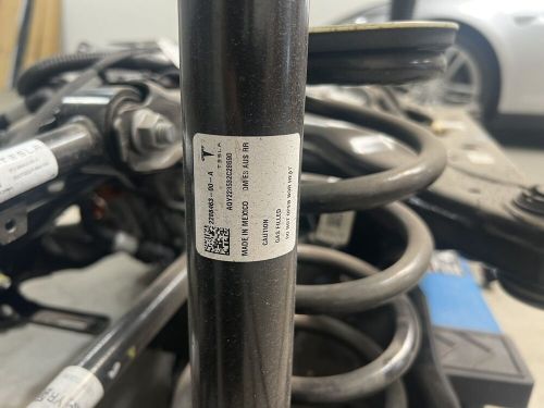 Tesla model y long range rear drive unit and suspension assembly