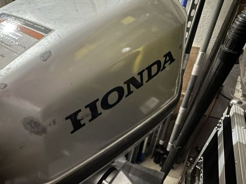 Honda dinghy outboard 5hp with long shaft.