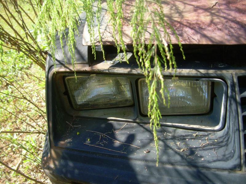 1979-1986 ford mustang right (passenger) head light bezel black