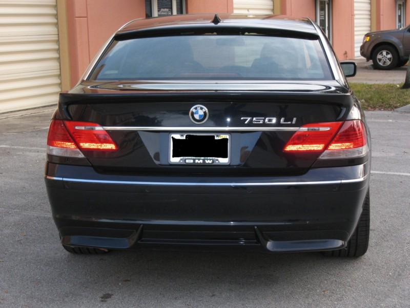 2005-2009 bmw 7-series e65 e66 acs style rap around rear lip spoiler (painted)