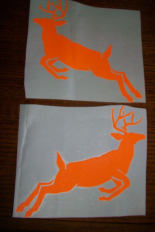 Flourescent orange running deer decals, set of 2, new in package