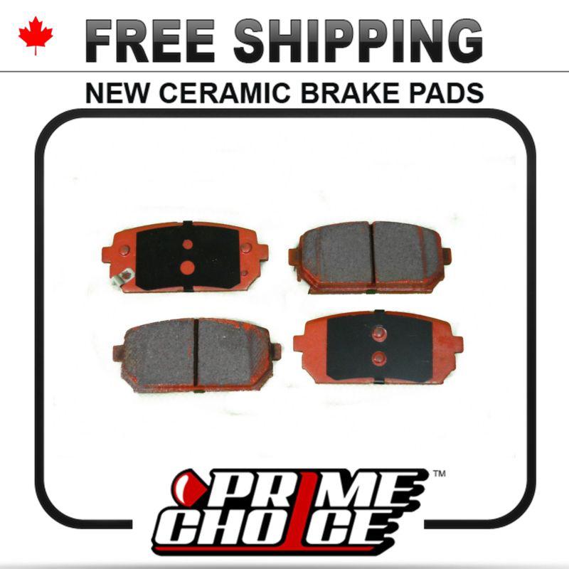 New premium complete set of rear ceramic disc brake pads with shims