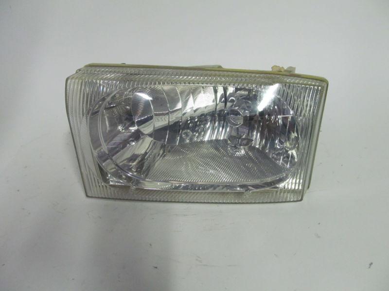 02 03 04 ford f250 f350 super duty pickup oem left headlight nice!!