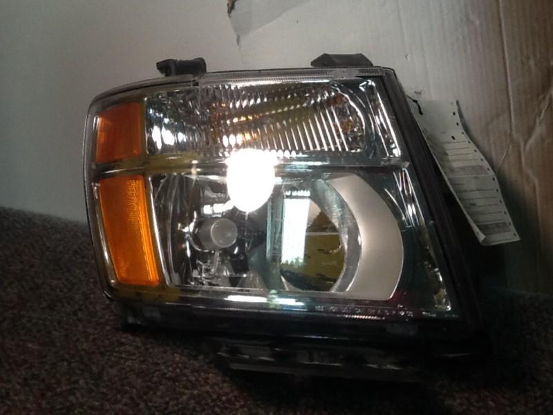 Nissan van headlight oem 2012