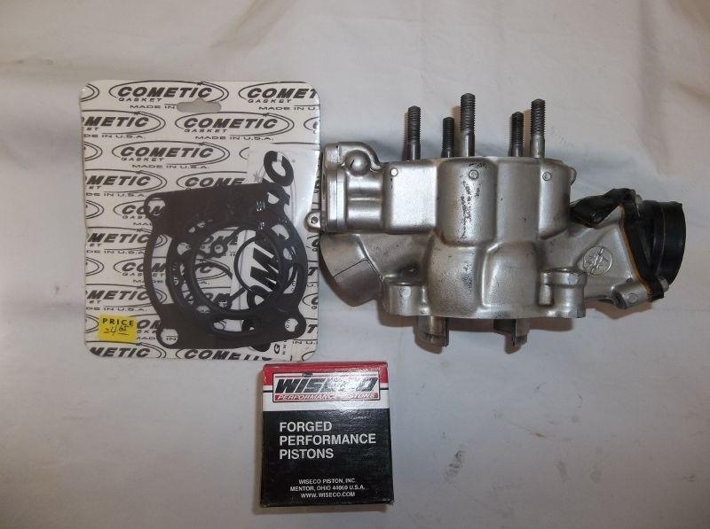 Resleeved kawasaki kx100 cylinder with new piston kit and top end gaskets