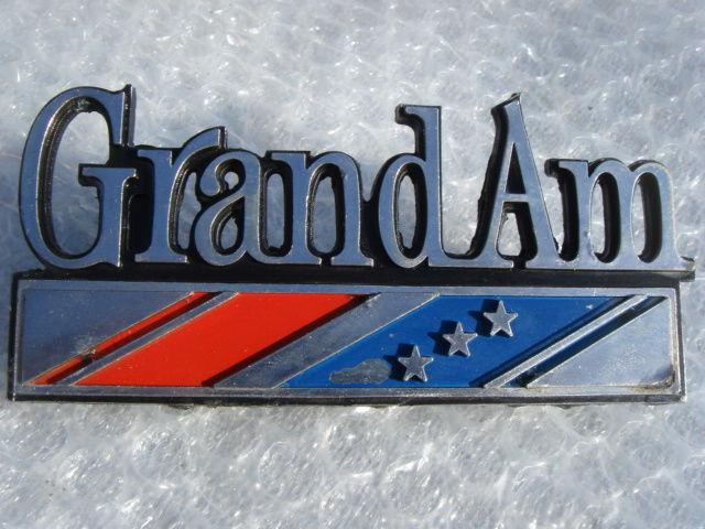 73 74 75 pontiac " grand am " fender emblem #2 gm part # 490627  l-7000 rare