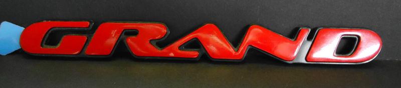 New oem gm "grand" am emblem fits l /r fr door/trunk 97-03 #22636895 2263-6895