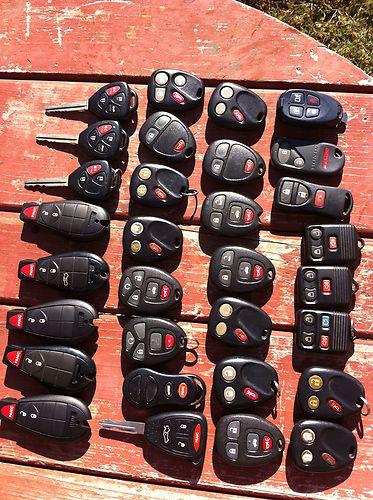 Locksmith lot 31 used keyless entry remotes fobs gm ford toyota dodge smart key