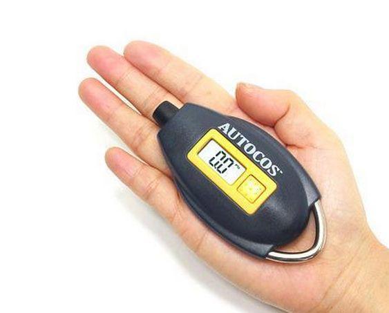 Motors portable digital tire gauge, key ring size, battery included, new & best.