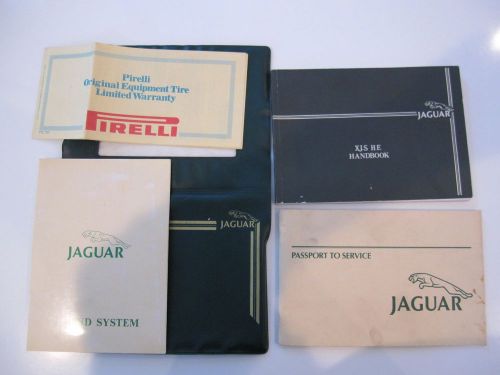 Very rare jaguar xjs h.e. owners manual, service &amp; sound system books and pouch