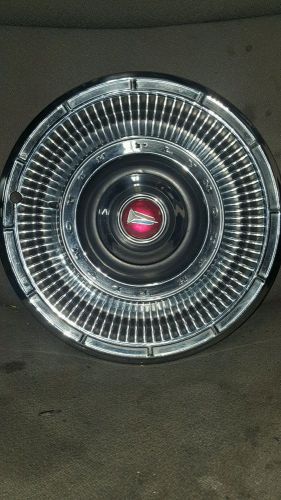 Vintage plymouth hubcap