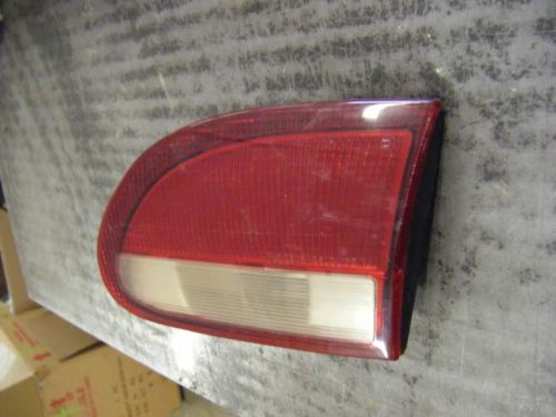 95 96 97 98 99 cavalier r. tail light lid mtd lens chevy 1 gm 12460