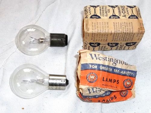 Vintage bayonet auto light bulbs westinghouse 120 v and one vosburg ge pat 1922