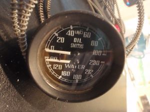 Smiths dual water oil gauge mga mgb bugeye mg midget black bezel