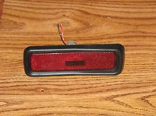 Geo tracker side left rear red marker light