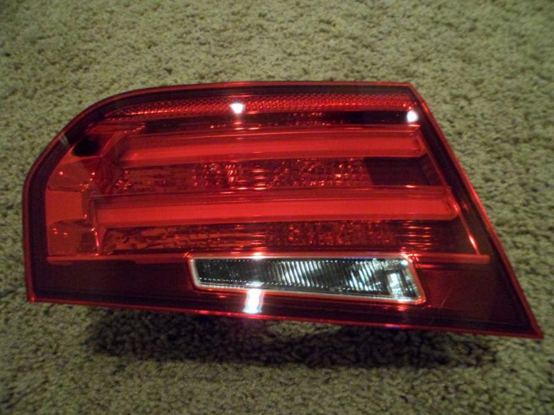 2012-2013 bmw 328i 335i  left (driver) side tail light on lid, 4dr,  oem