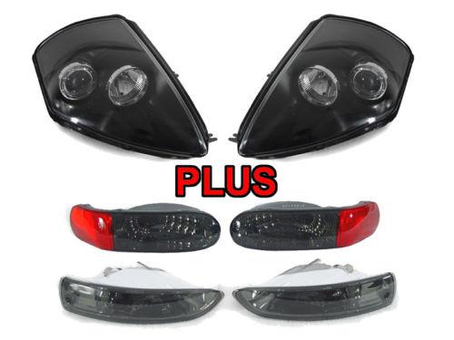 03-05 mitsubishi eclipse headlight+smoke bumper/reverse