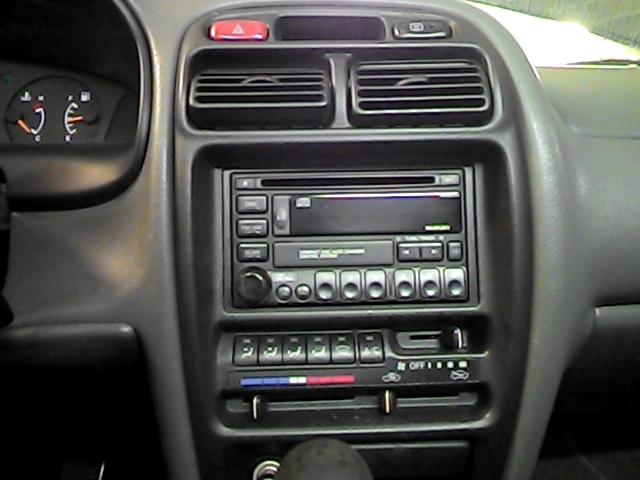 2001 suzuki esteem radio trim dash bezel 2622015