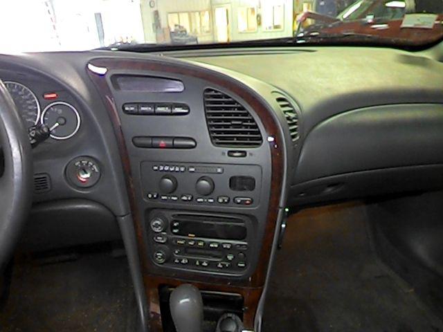 2001 oldsmobile aurora radio trim dash bezel 2596016