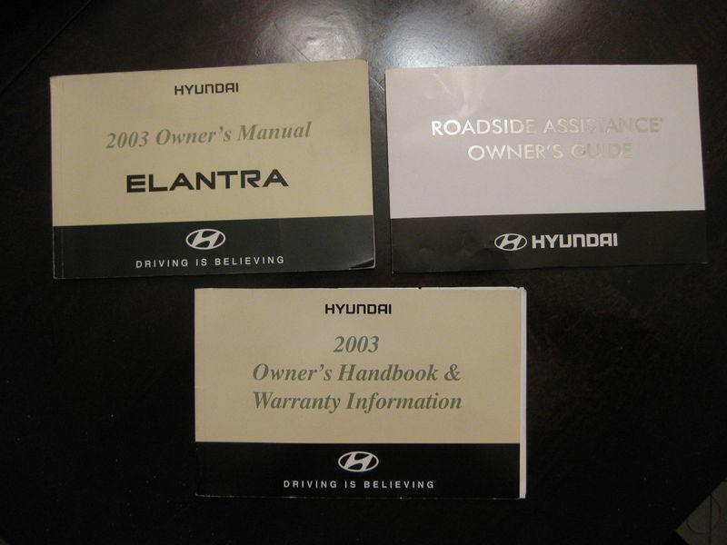 03 2003 hyundai elantra owner's manual with the books.    free shipping