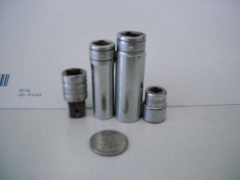 4 pc. snap-on sockets 3/8 & 1/4 dr.  7/16 , 9/16 , 1/2 & 3/8 to 1/2 adapter