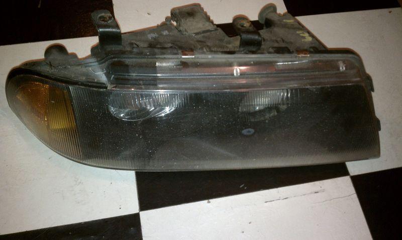 97 98 99 01 02 03 mitsubishi diamante right headlight 7091 r