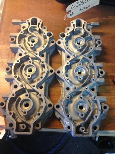 Evinrude/johnson/omc cylinder heads 0330054 0330053 with head gaskets nos