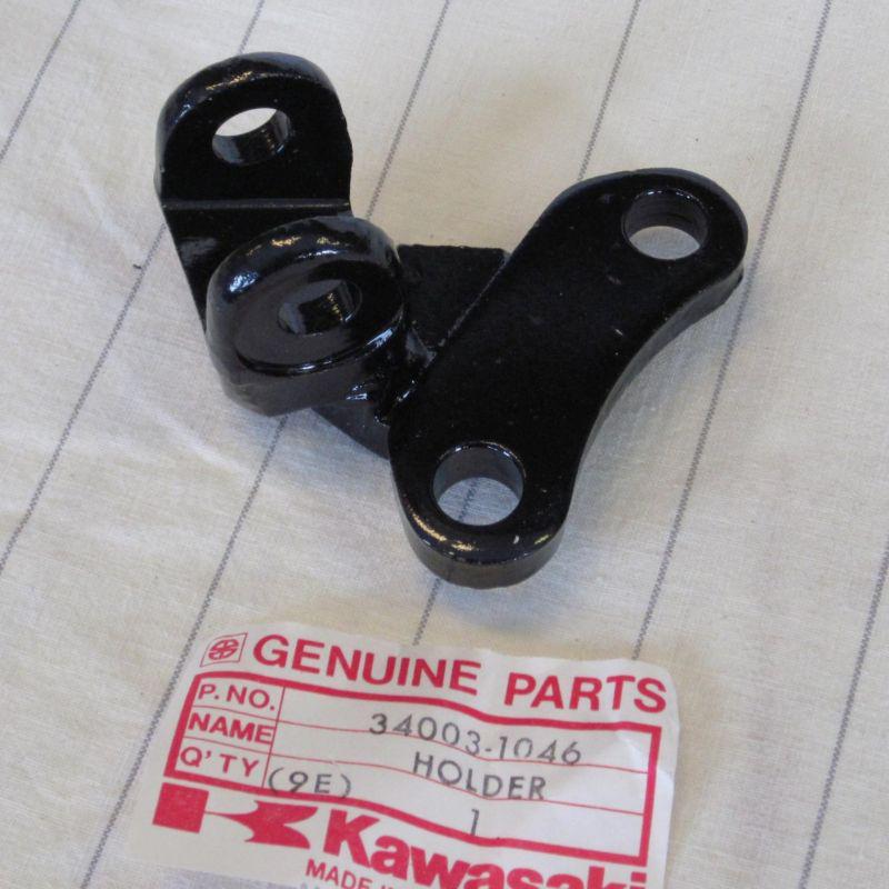 Kawasaki klx250 a1 a2 1979-1980 rh footrest bracket holder step 34003-1046 nos