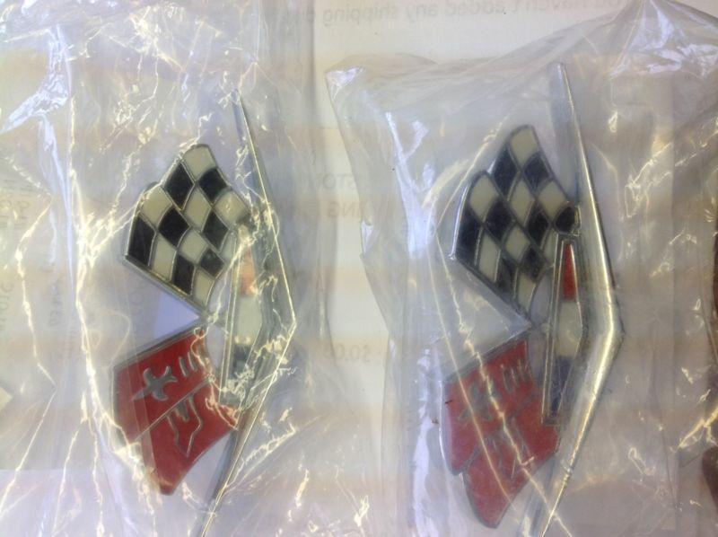 Brand new 63 corvette gm restoration crossed flag side emblems thick model