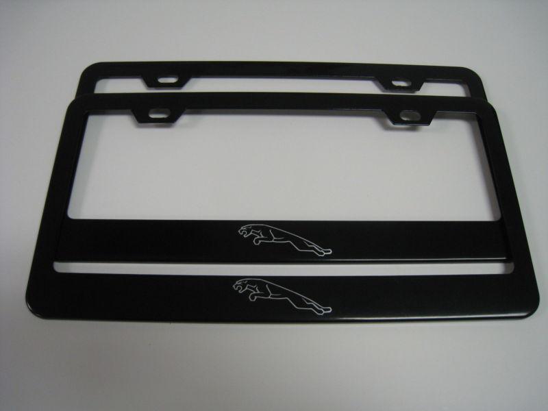 (2) black coated metal license plate frame - jaguar "logo"