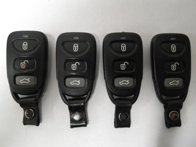 Used kia lot of 4 keyless entry 95430-2g202 transmitters red led osloka-310t