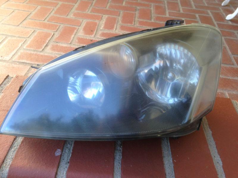 05 06 nissan altima left (driver side) headlight oem, factory