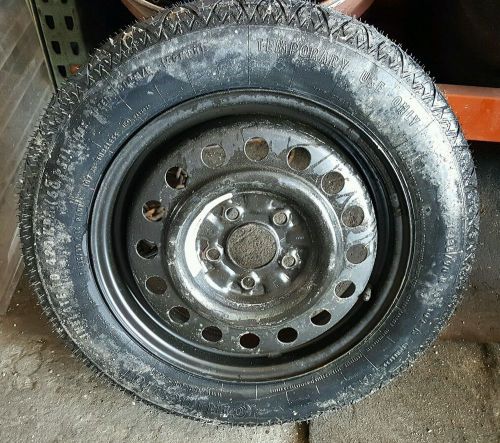 Nissan altima spare tire in trunk