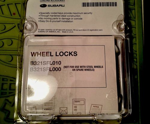 “new” -  set of four genuine subaru steel wheel locks - - -  b 321sfl010  oem