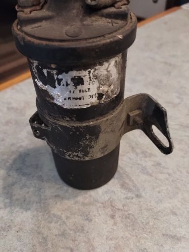 Marine ignition coil and bracket pre-owned