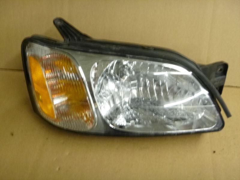 2000 - 2004 subaru legacy headlight left side (oem) used